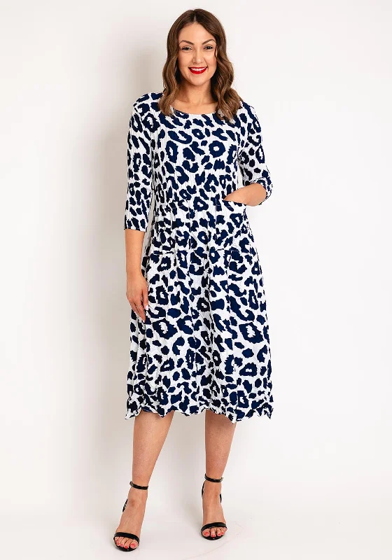 Alquema Smash Pocket Crinkle Print Midi Dress, Indigo Leopard Must-have midi dresses for this season Alquema Smash Pocket Crinkle Print Midi Dress, Indigo Leopard Must-have midi dresses for this season